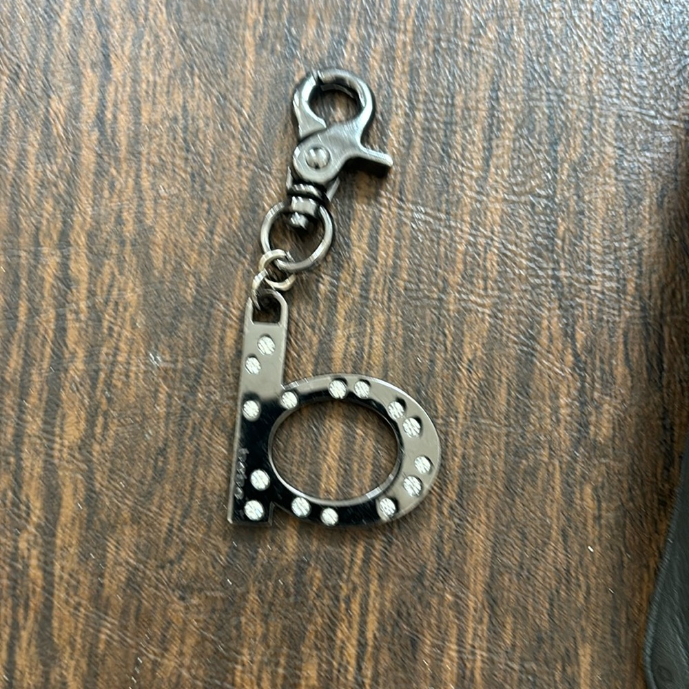 Bebe purse accessory